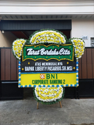 Papan Bunga Duka di Monta
