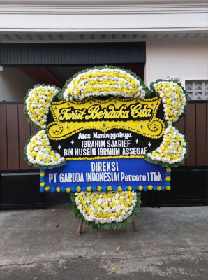 Papan Bunga Duka di Monta