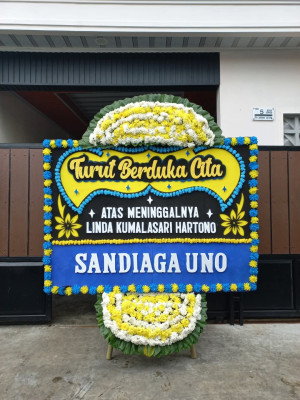 Papan Bunga Duka di Monta